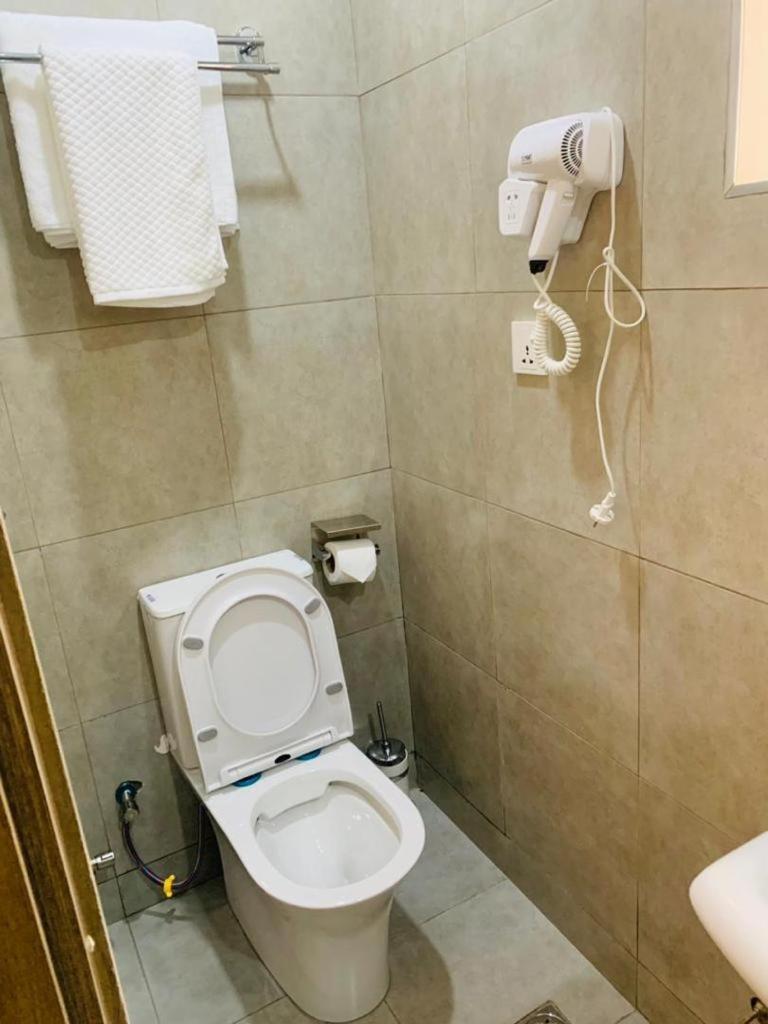 Swiss Pearl Continental Suite Wupa Esterno foto